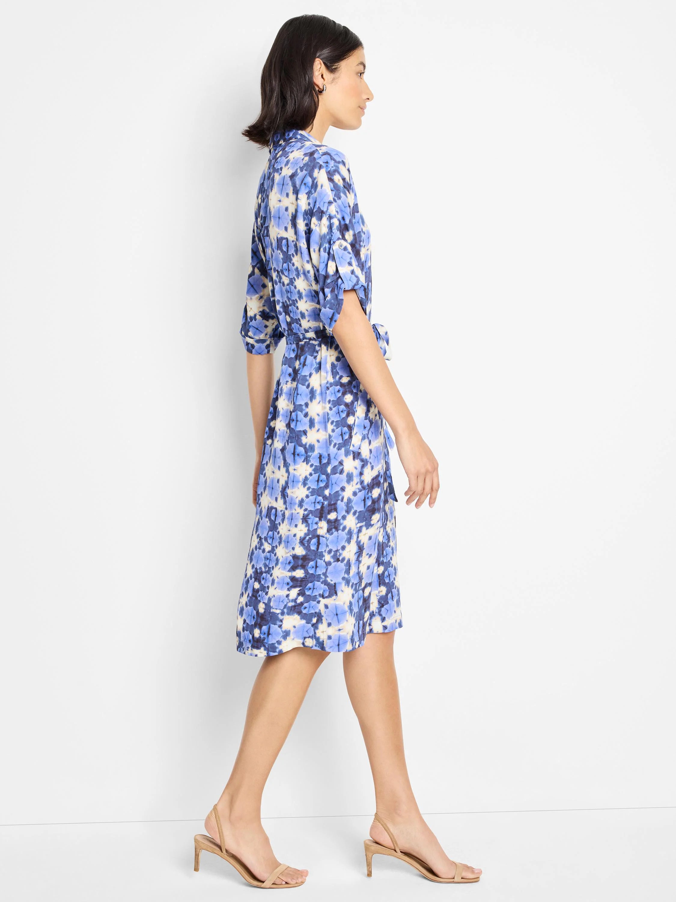 Blue, beige, and white shibori print belted midi dress with short sleeves.