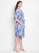 Blue and beige tie-dye patterned knee-length belted shirt dress with short sleeves and pockets.