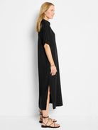 Black linen tunic dress, midi length, short sleeves, side slits.