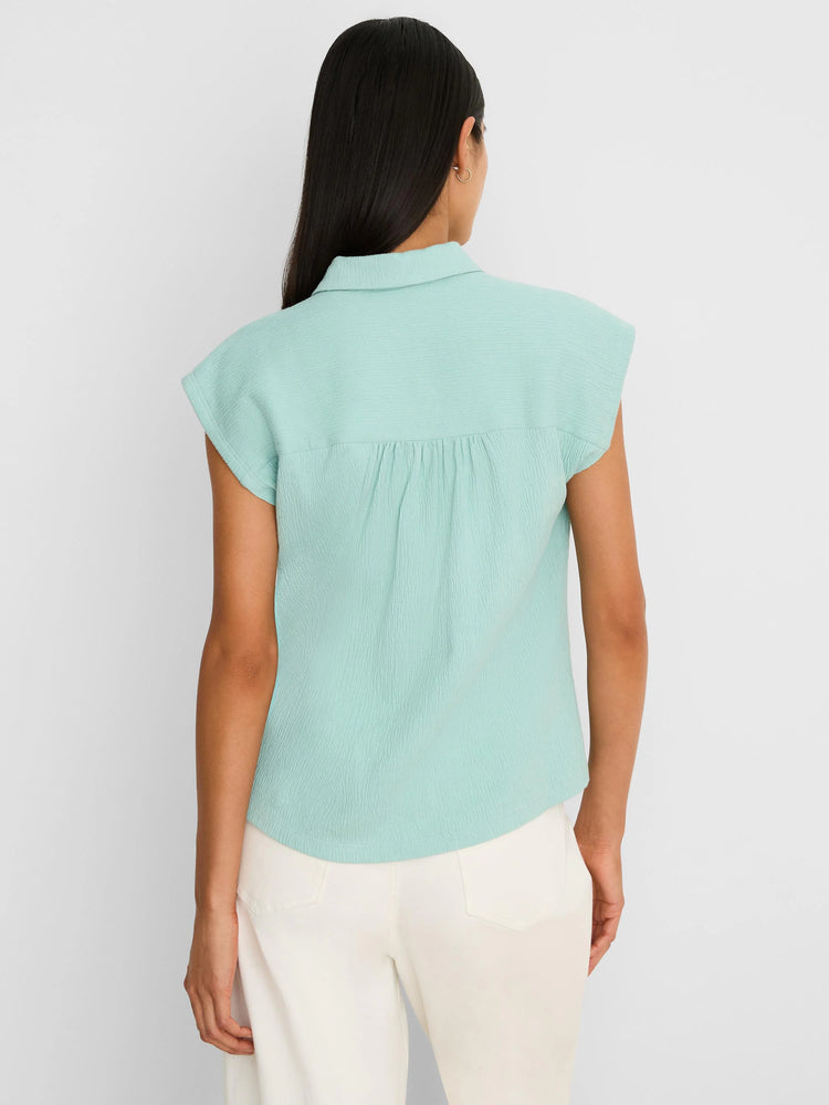 Mint green crinkle top with a collar, cap sleeves, and gathered detail on the back yoke.