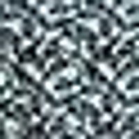 Granular silver-grey with black specks, subtle metallic texture.