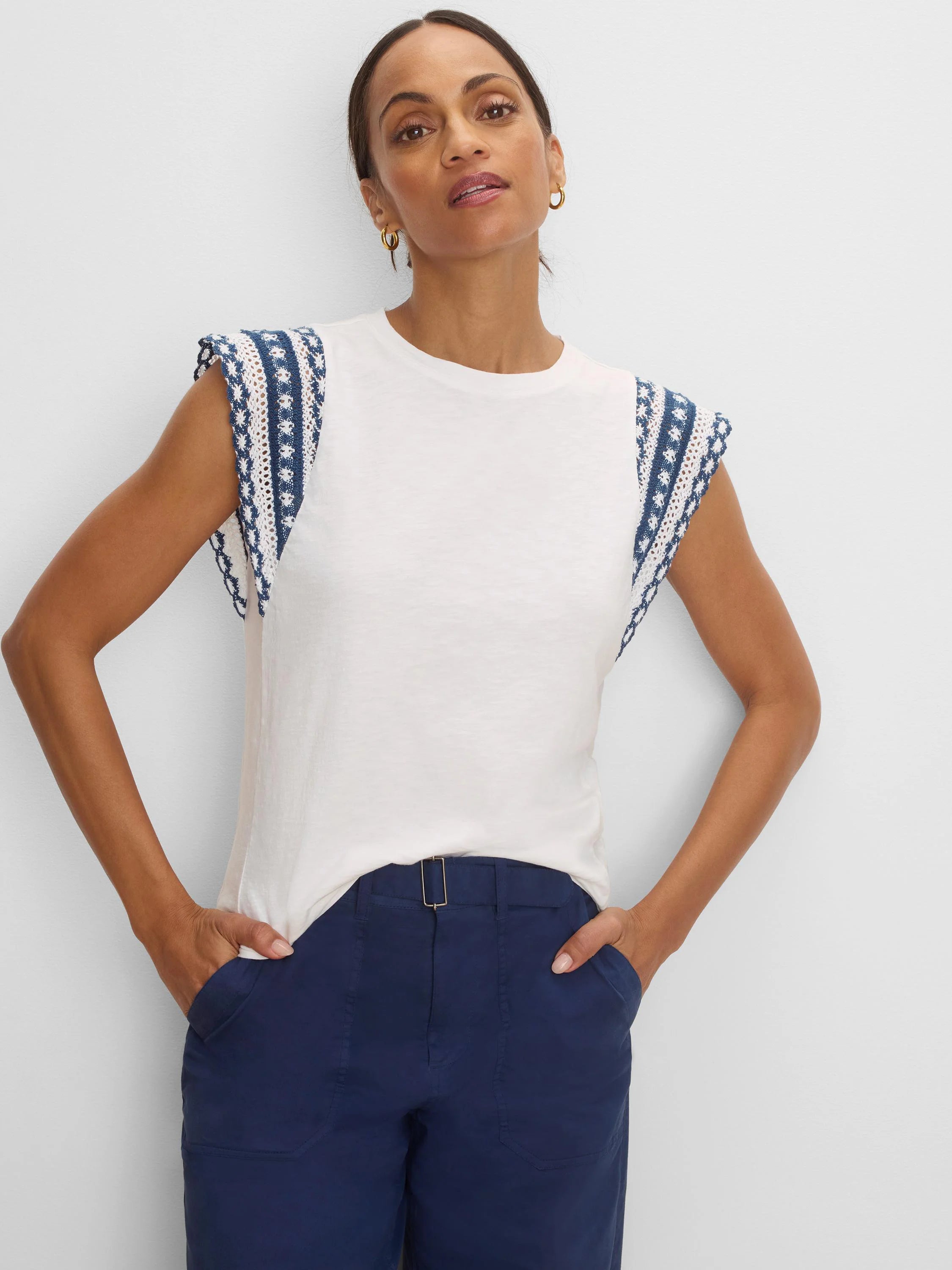 Off-white cotton slub top, crew neck, with navy & white patterned knit shoulder trim.