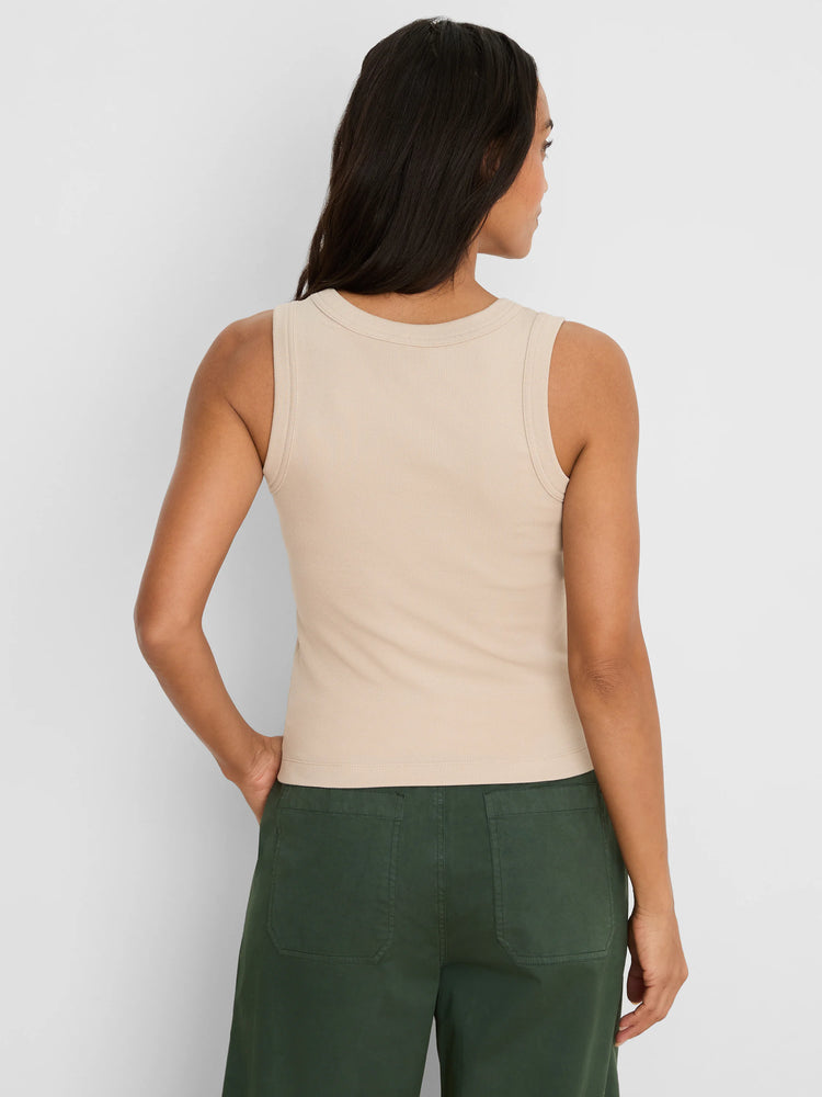 Light beige ribbed knit tank, rounded back neckline.