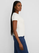 Off-white short-sleeve tee with an all-over crinkled texture.