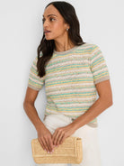 Short-sleeve knit tee with horizontal stripes in beige, yellow, and mint green.