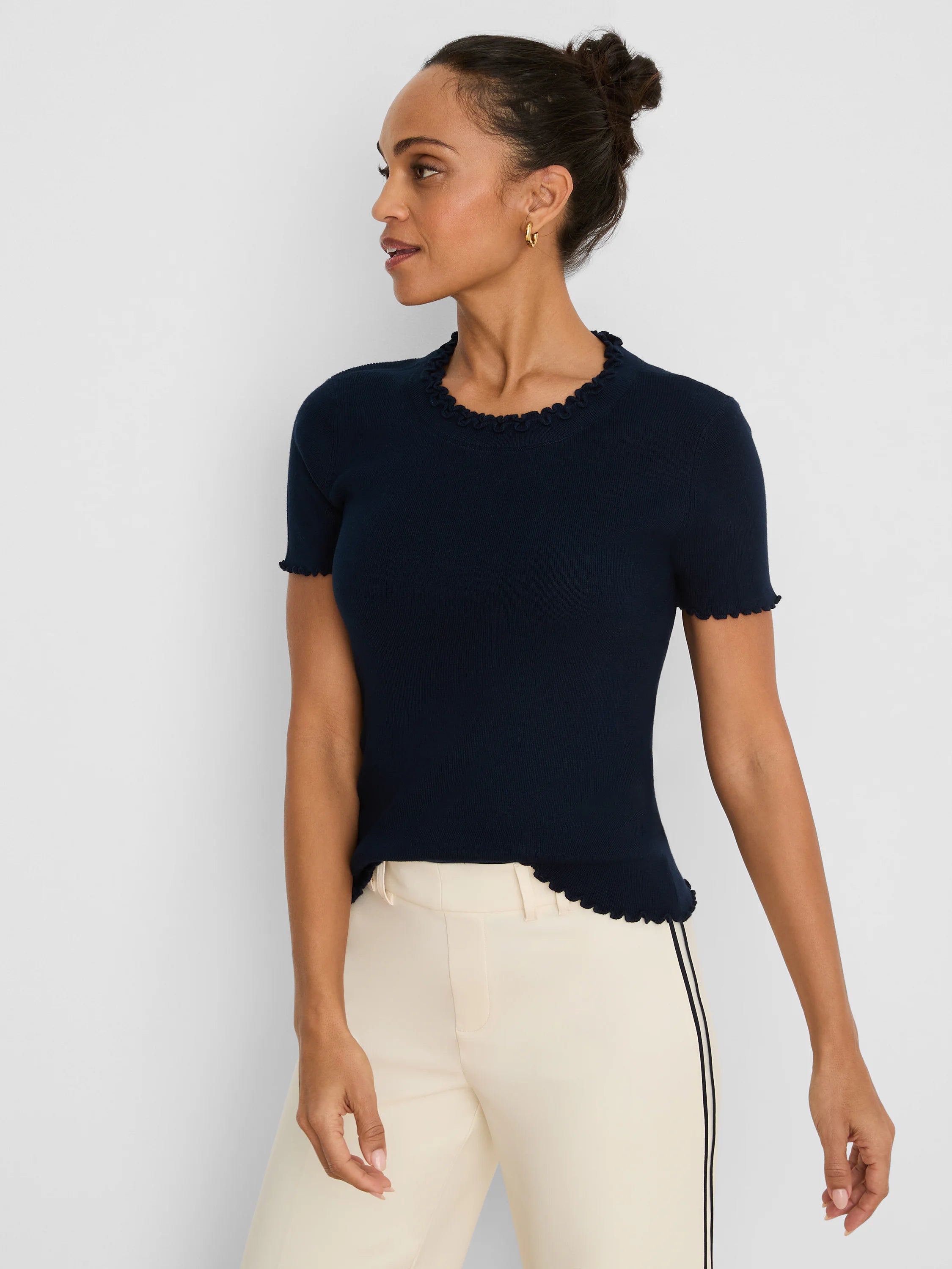 Dark navy blue short-sleeve ribbed sweater tee with ruffle trim on neckline, sleeves, and hem.