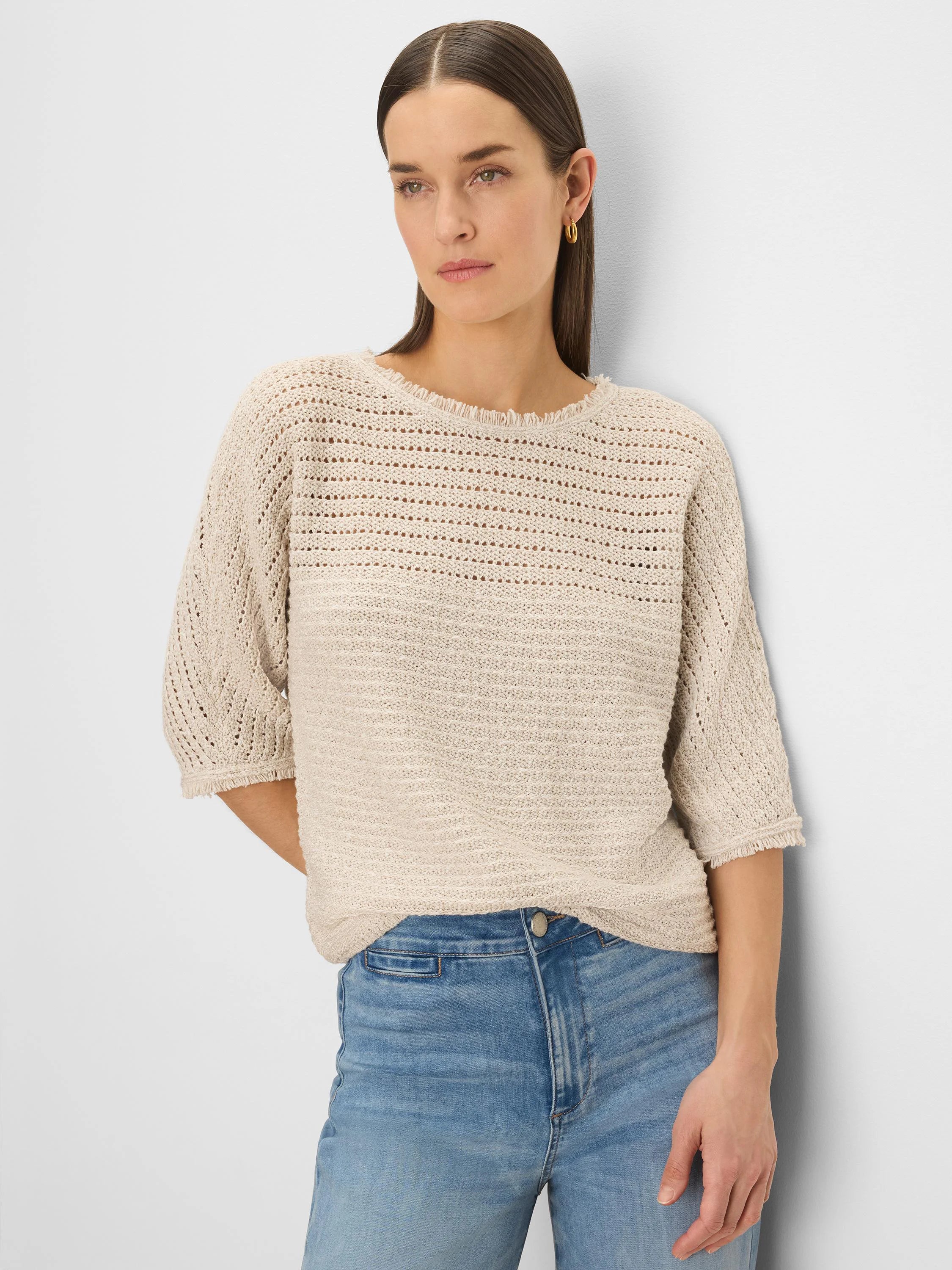 Oatmeal open-knit sweater with tonal textures, frayed neckline & 3/4 sleeves with frayed cuffs.