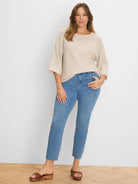 Oatmeal open-knit sweater, loose fit, with fringed neckline/cuffs and 3/4 sleeves.