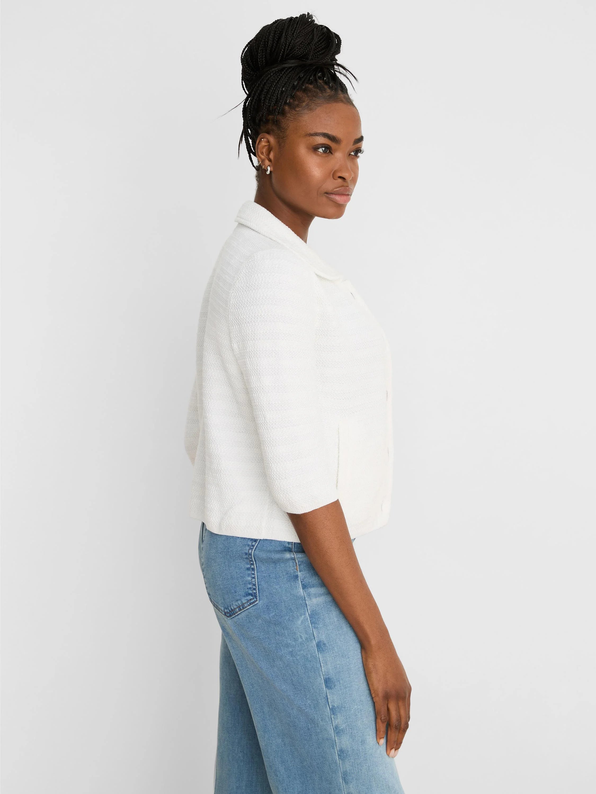 White elbow-sleeve textured knit jacket with a collar.