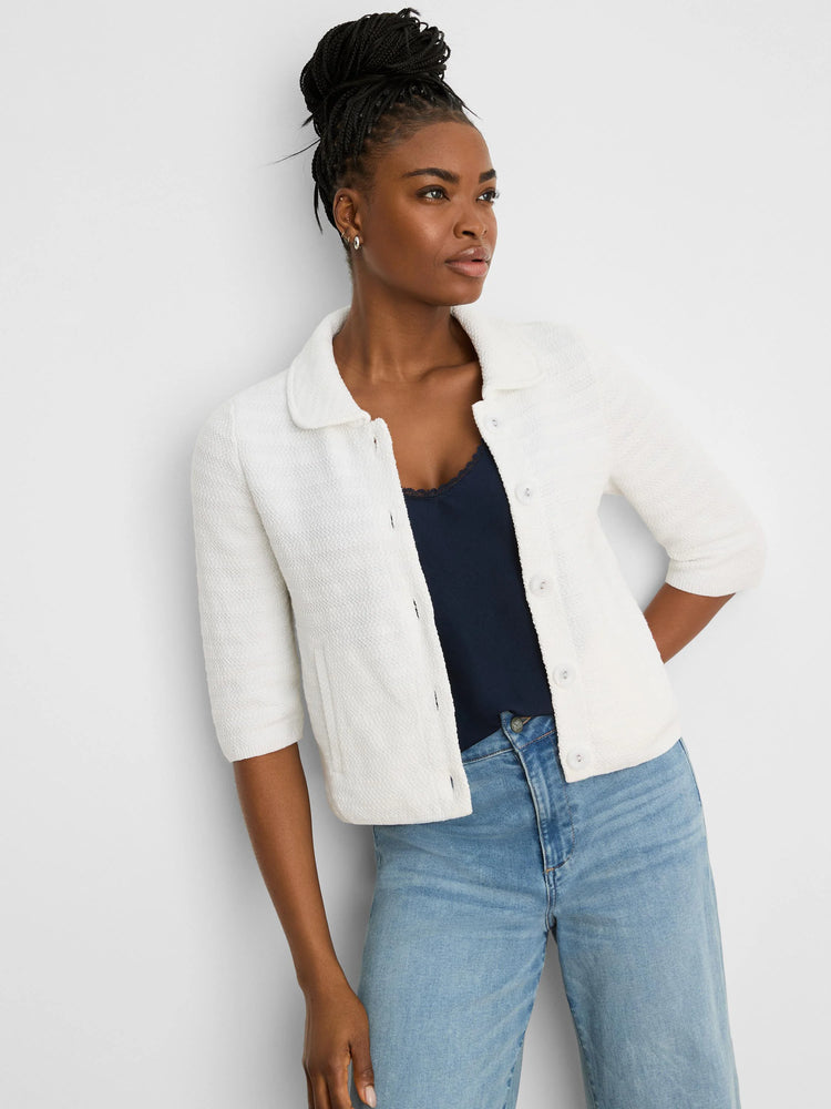 Cream elbow-sleeve textured knit jacket with a rounded collar and button front.