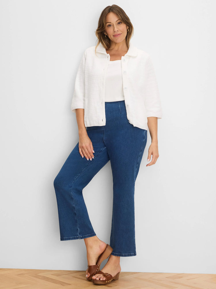 White textured knit jacket with elbow sleeves and front buttons.
