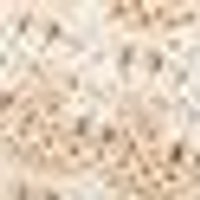 Mottled light beige and cream with dense dark brown speckles, giving a granular texture.