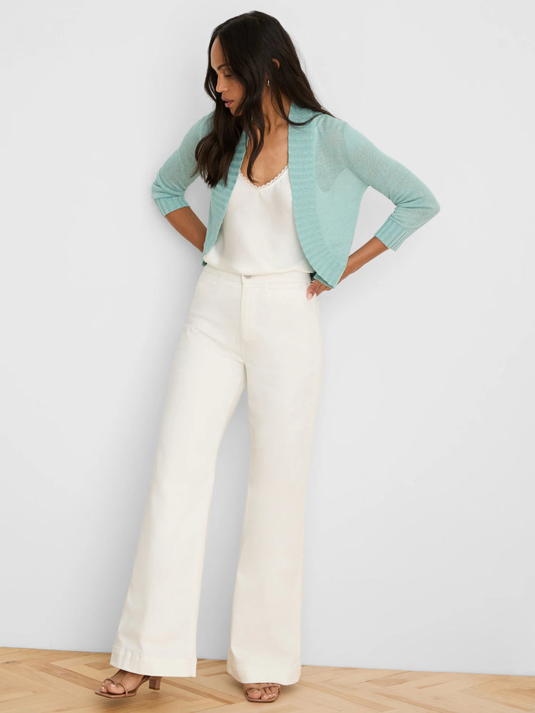 Aqua cropped bolero cardigan with 3/4 length sleeves and ribbed edges.