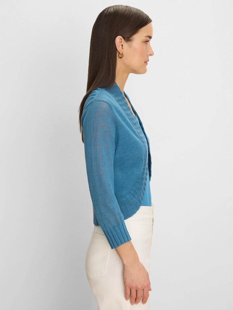 Teal blue bolero cardigan. Lightweight sheer knit, 3/4 sleeves, open front, ribbed collar and cuffs.