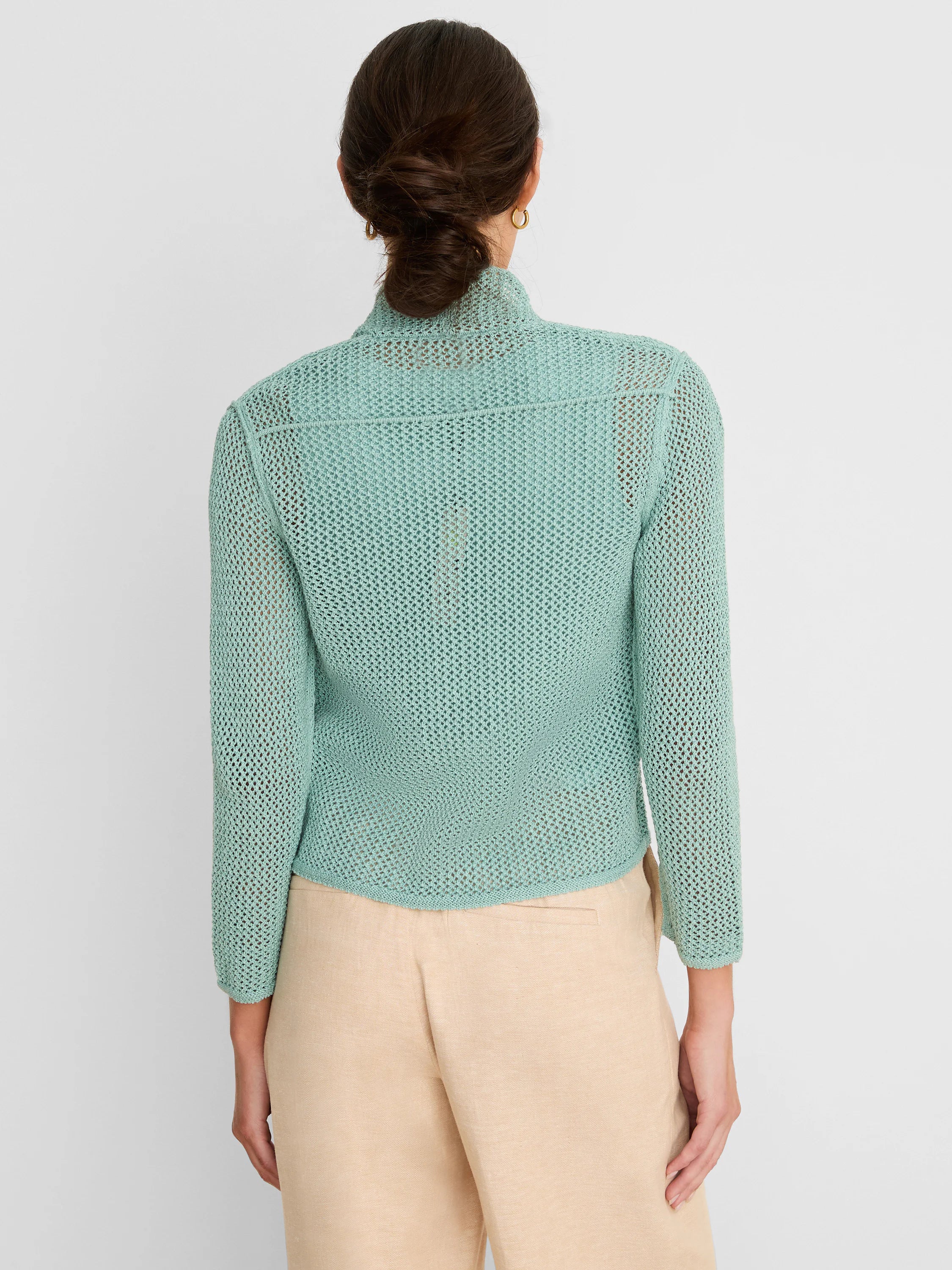 Mint green open-knit mesh cardigan with a relaxed cocoon fit, shown from the back.