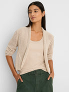 Ecru open-knit mesh cocoon cardigan with 3/4 sleeves.