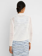 White mesh cocoon cardigan, back view. Loose, open knit with long sleeves.