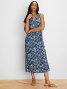 Blue and white shibori patterned sleeveless V-neck midi dress.