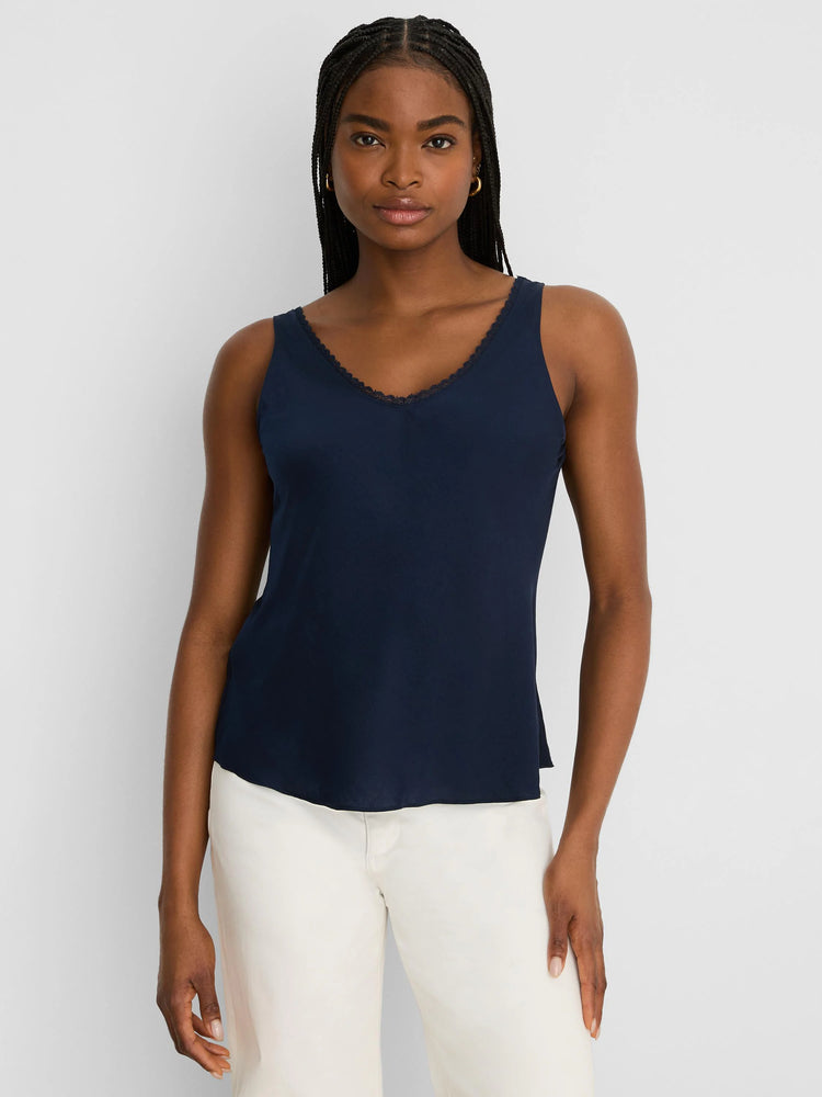 Navy blue V-neck tank top with matching dark lace trim along the neckline.