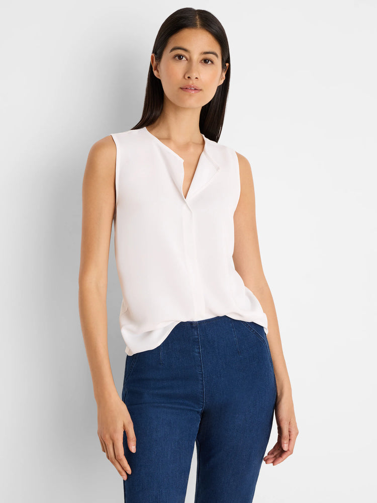 Off-white sleeveless V-neck top with a collared placket.