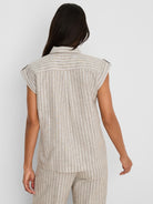 Beige Lurex linen shirt with subtle shimmering white vertical stripes, collar, cuffed short sleeves, and back pleat.