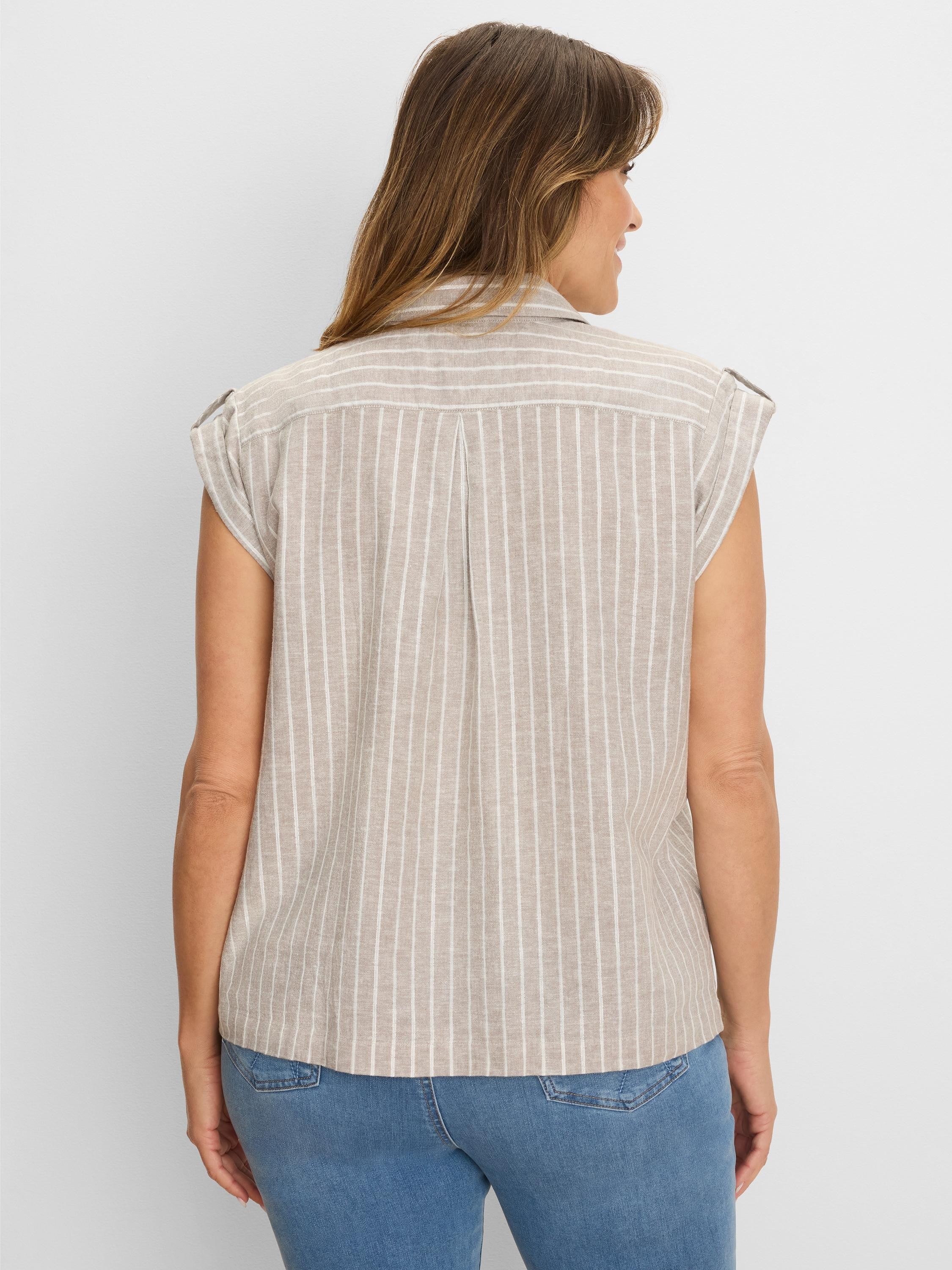 Beige linen resort shirt with shimmering white vertical stripes, cap sleeves, and shoulder tabs, viewed from back.