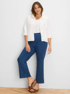 Dark blue, high-rise boot-cut jeans.