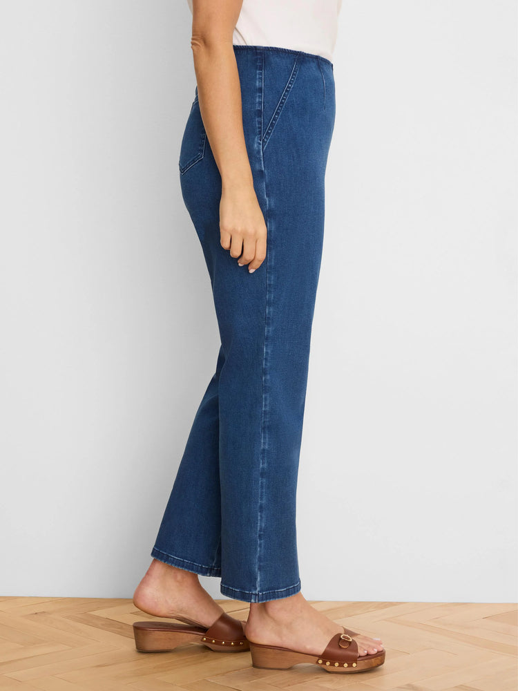 Deep blue high-waisted bootcut jeans. Features a smooth waistband and full-length leg.