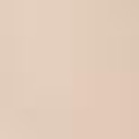 Smooth, matte, pale beige with subtle peachy undertones. Texture suggests finely milled powder.