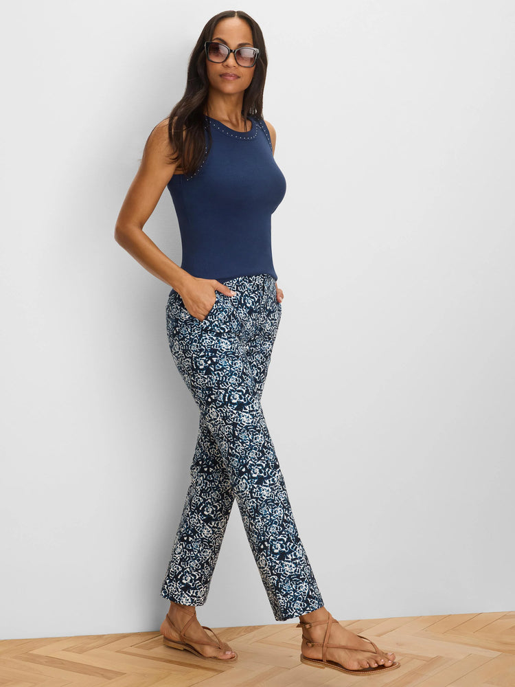 Dark blue & white shibori lily ankle pants. Fitted through hip & thigh, with a demi-boot leg.