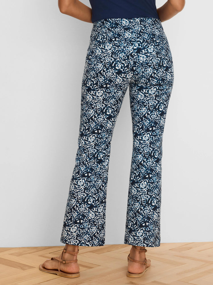 Navy and white shibori-patterned demi-boot ankle pants.