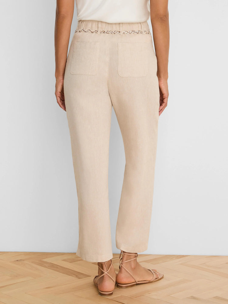 Beige wide-leg linen crop pants, seen from behind. Features a braided belt and two back patch pockets.