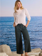 Dark green wide-leg ankle pants. Features a matching belt with a rectangular buckle and front patch pockets.