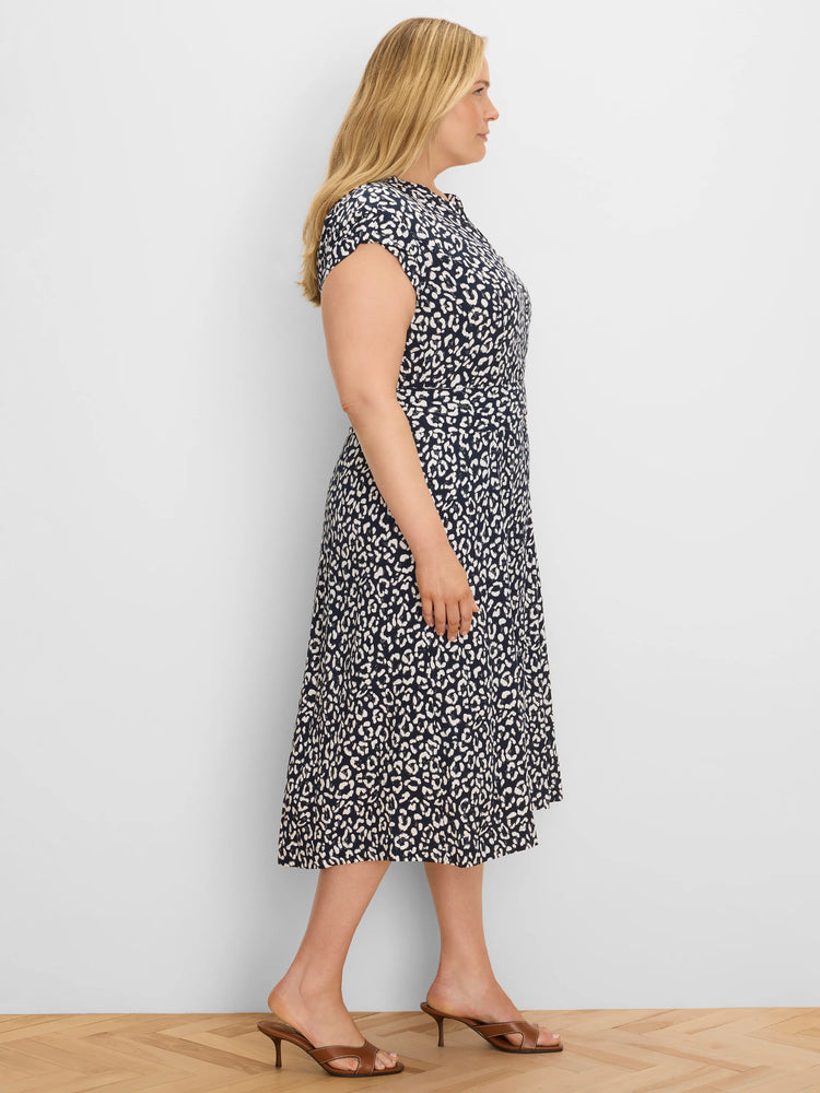 Navy and white sketched leopard print midi dress with cap sleeves and a cinched waist.