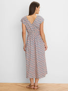 Cap sleeve midi dress with pink, blue, beige geometric pattern, V-back, and elasticated waist.