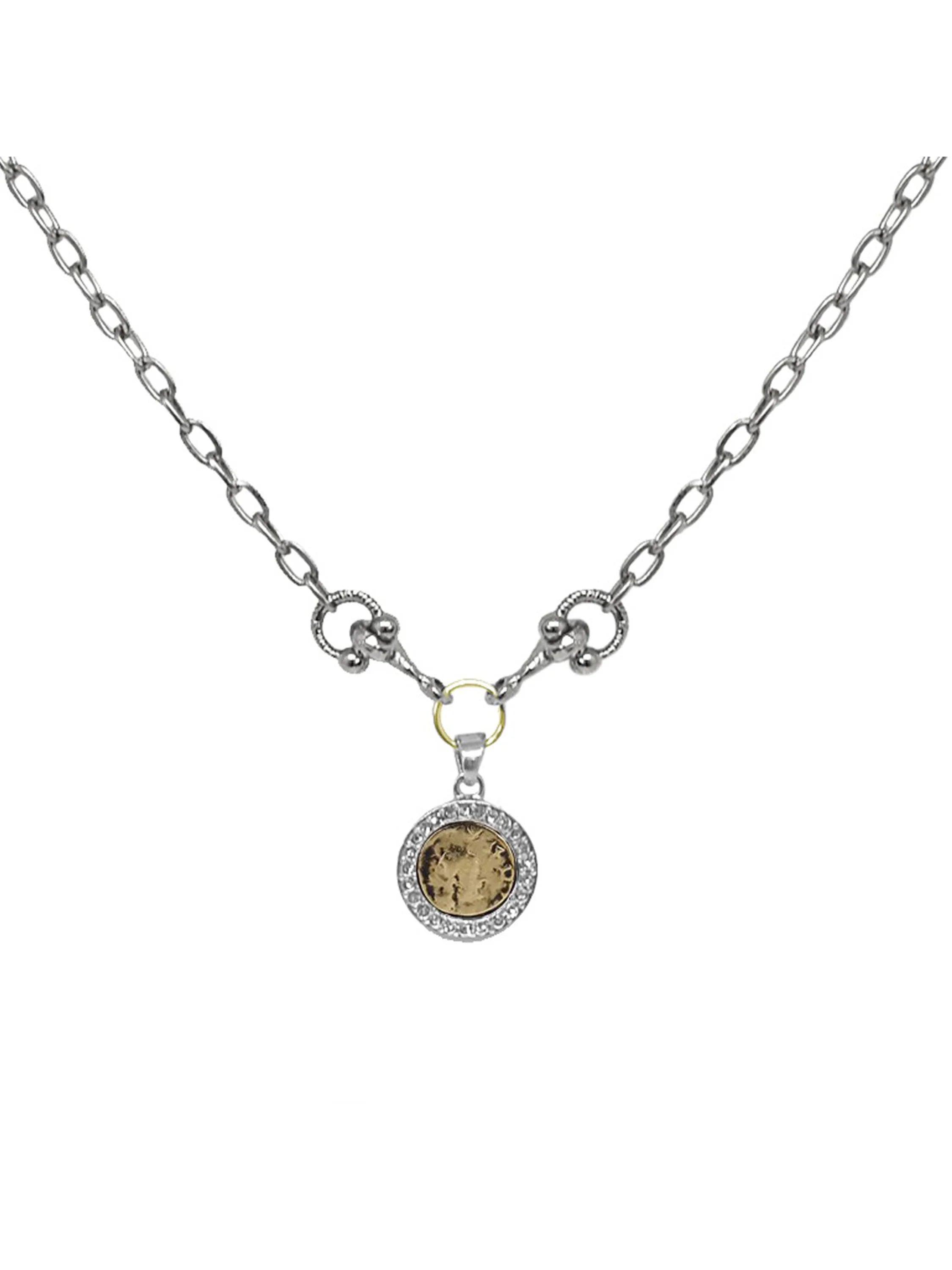 Silver chain necklace with a circular, antique gold coin pendant framed by small, clear stones.