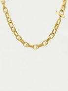 Gold, matte finish necklace.  Interlocking rectangular links,  bar clasp with logo.