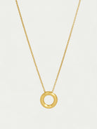 Gold chain necklace with a matte gold,  thick ring pendant.
