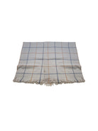 Off-white windowpane scarf with blue and tan lines, fringed ends.