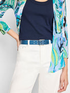 Deep teal, crocodile-embossed belt with a silver double-prong buckle and studs.