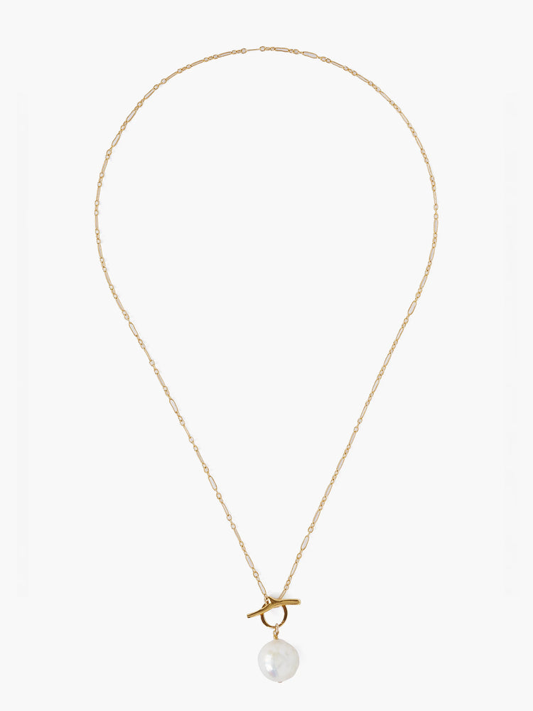 Gold chain necklace with a large, off-white pearl toggle clasp.