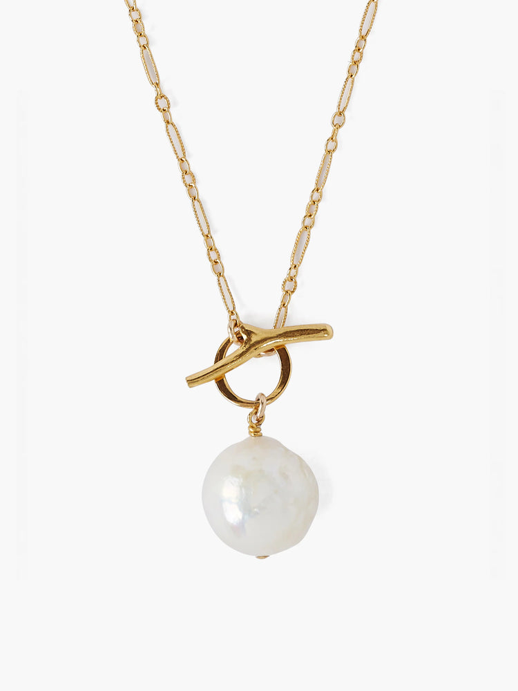 Gold chain necklace with a large white pearl and gold toggle clasp.