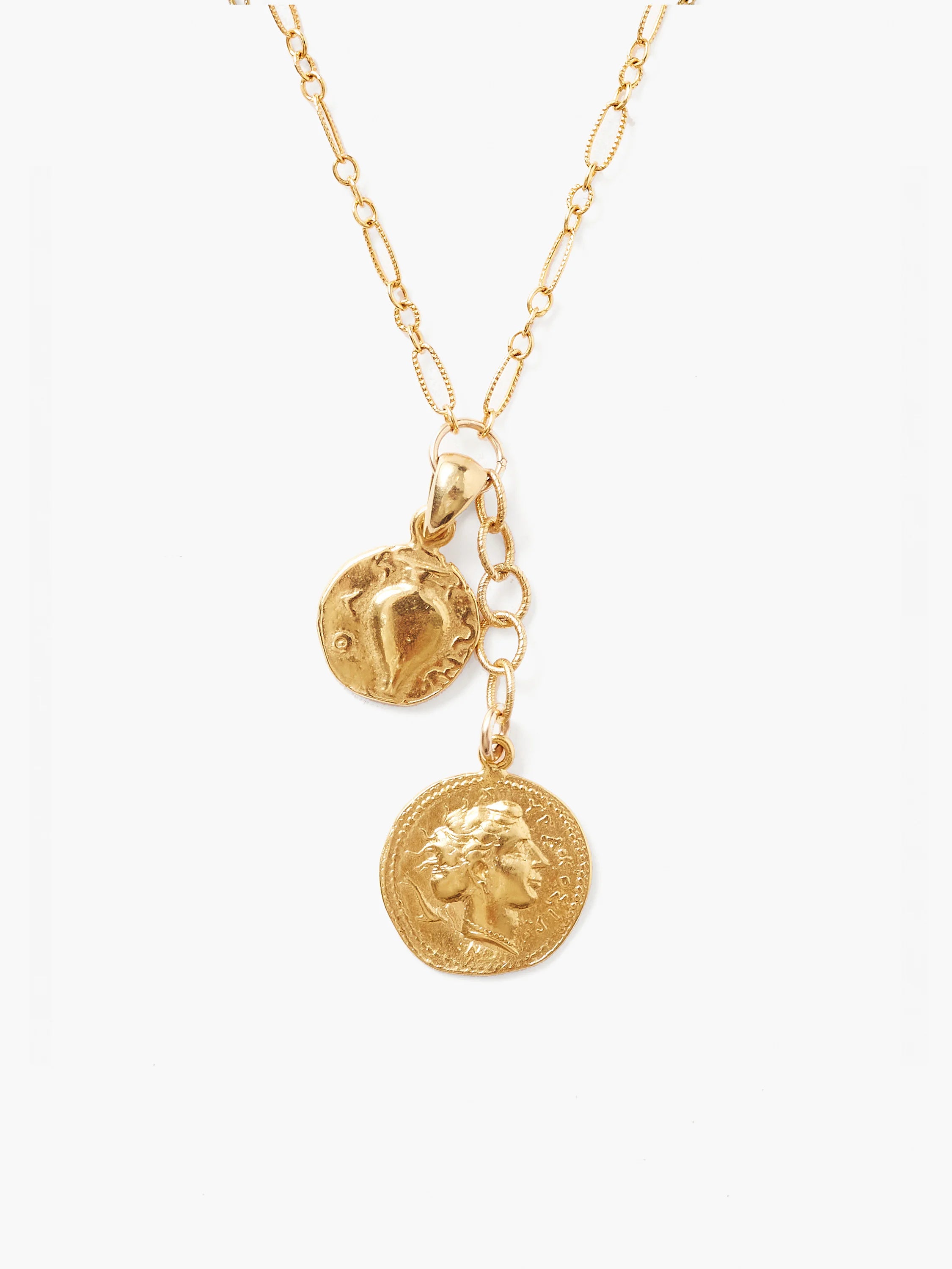 Gold necklace with two gold coin charms; one features a profile, the other an abstract design.  Gold chain.