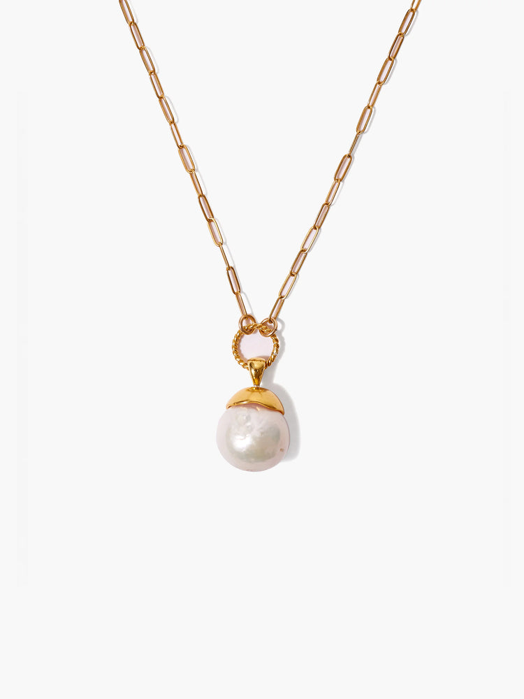 Gold chain necklace with large off-white pearl pendant; twisted gold detail at clasp.
