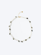 Necklace with alternating white pearls, grey-green teardrop stones, and small gold beads. Features a gold clasp and extender.