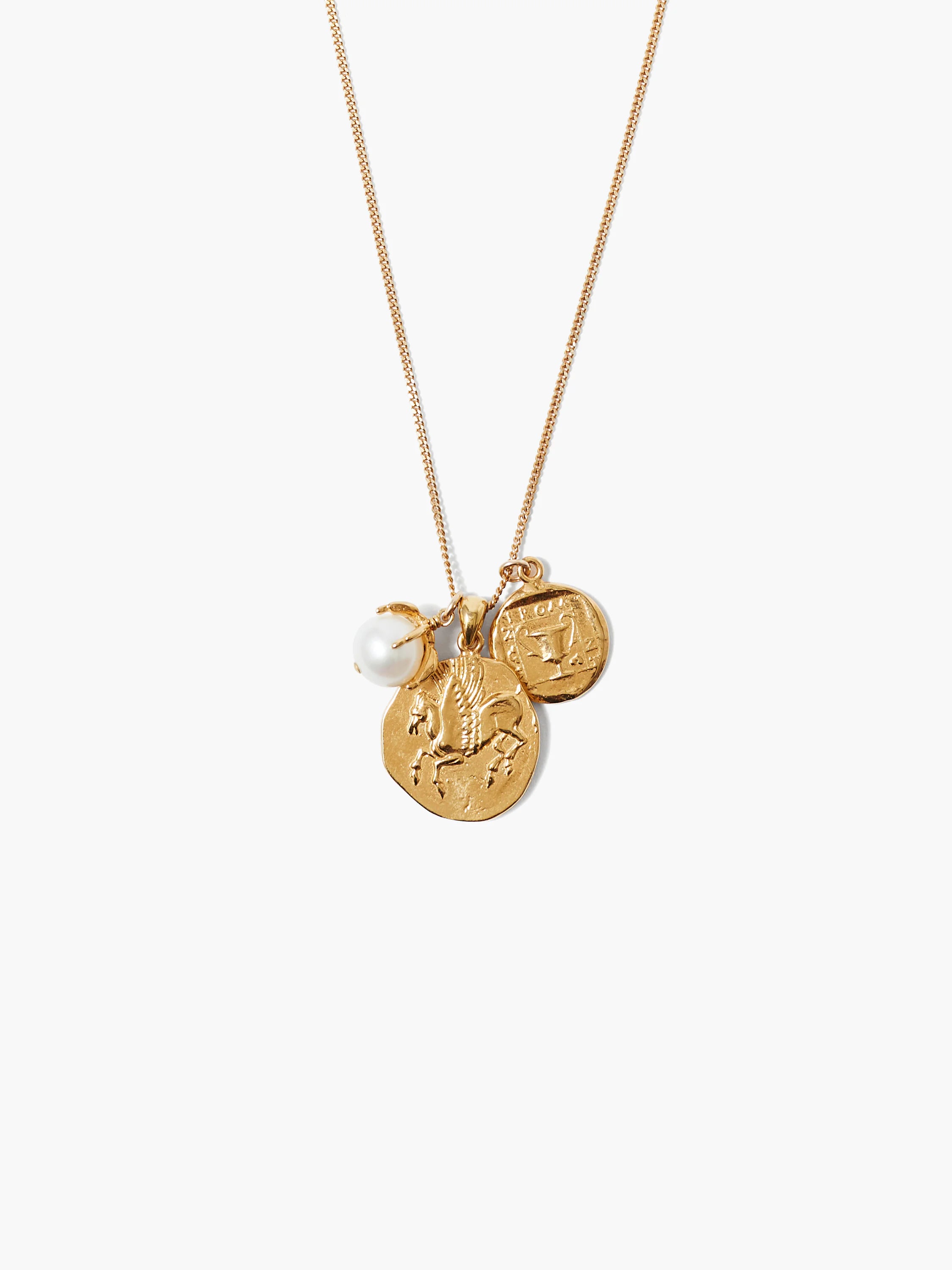 Gold chain necklace with three pendants: a large gold coin with a winged horse, a smaller gold coin with a bird, and a...