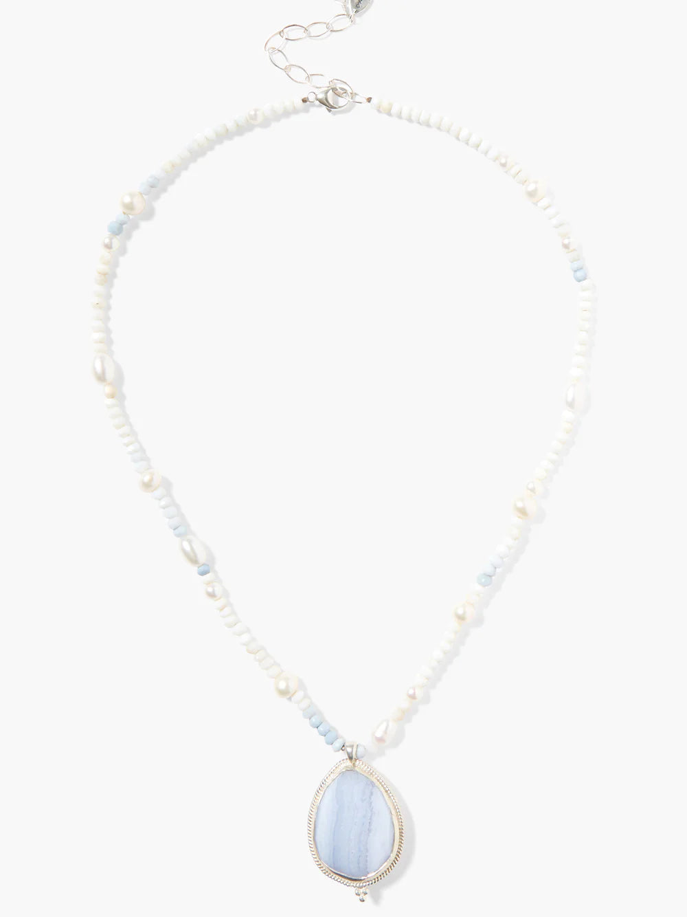 White beaded necklace with irregular pearls, light blue accent beads, and a pale blue banded agate pendant in silver.