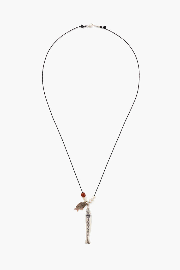 Black cord necklace with a silver fish pendant, smaller copper fish charm, two white pearls, and one red bead.