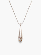 Silver chain and teardrop pendant.  Pendant features iridescent abalone inlay in whites, browns, and pinks.