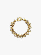 Gold chain bracelet featuring a double row of thick, oval links and a lobster clasp.